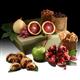 6lbs. fresh, seasonal fruits, roasted almonds, rugelach and chocolate-dipped pomegranate seeds from shiva.com.