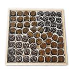 66 artisanal chocolate truffles on a glass platter from shiva.com. Kosher