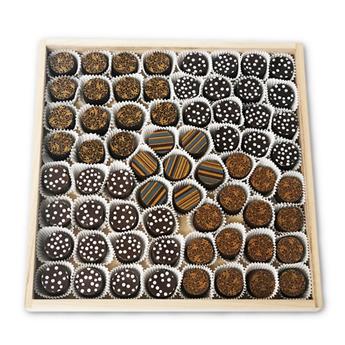 66 artisanal chocolate truffles on a glass platter from shiva.com. Kosher