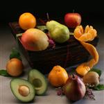 5lbs. of seasonal fresh fruit in a gift box with fresh leaves and flowers from shiva.com.